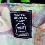 a patch that has a tombstone labeled "margaret thatcher", above it written "Gender Neutral Toilet"