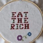 "eat the rich" crossstitch in progress