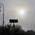 a foggy sky blocking the sun