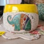 a mug with a painted elephant on it