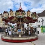 merry-go-round roped off with covid signs
