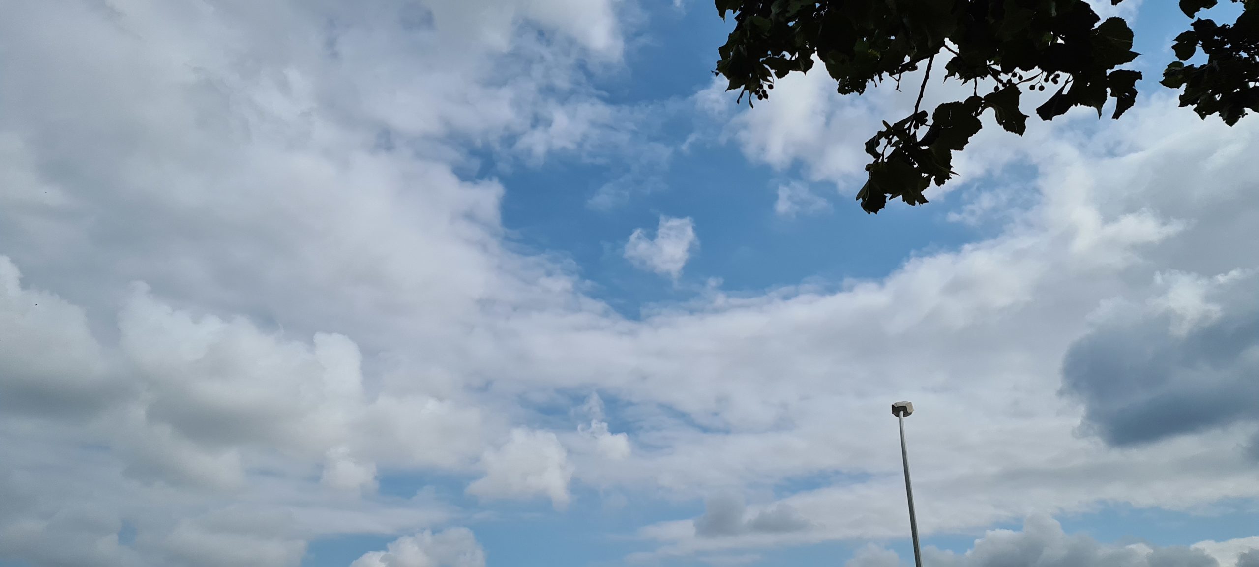 lots of white clouds on a blue sky