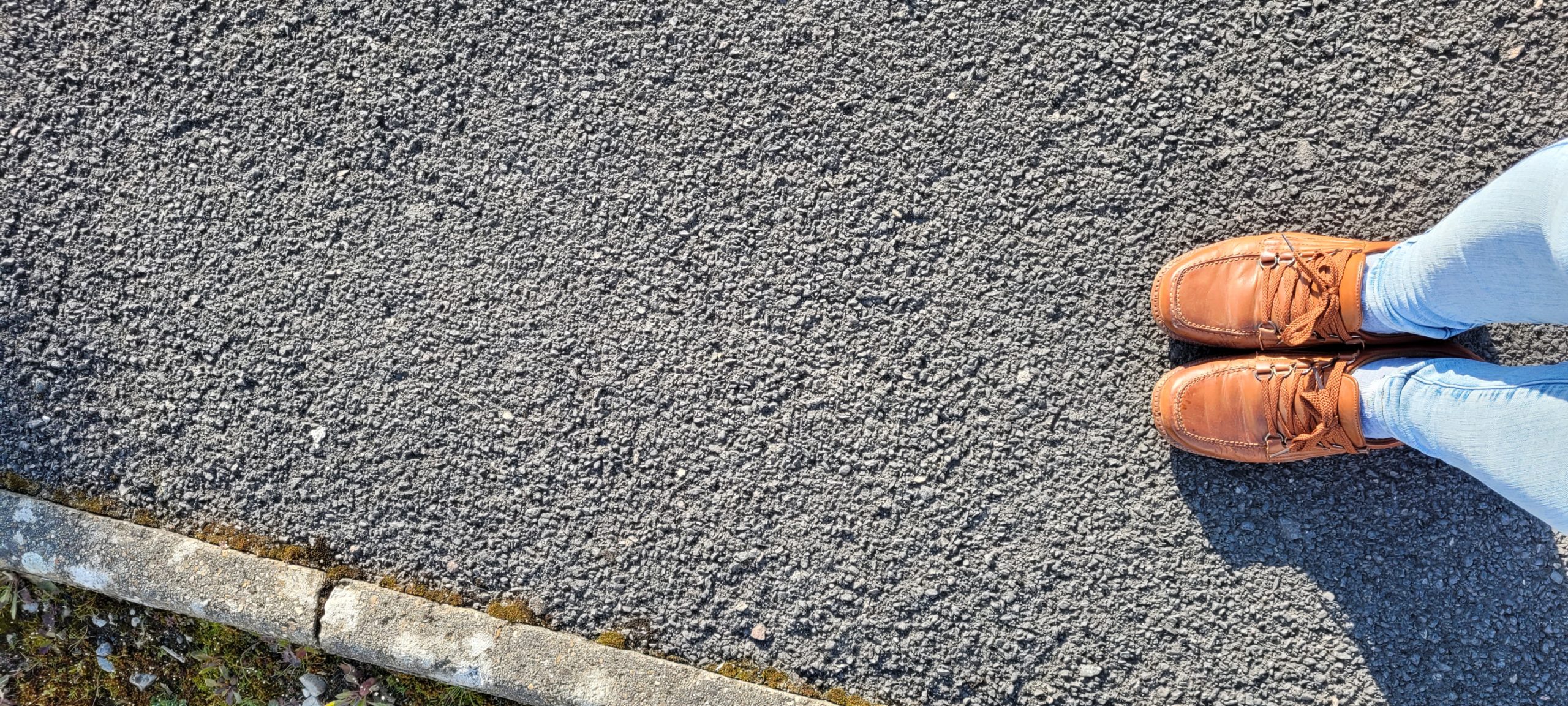 some shoes on pavement