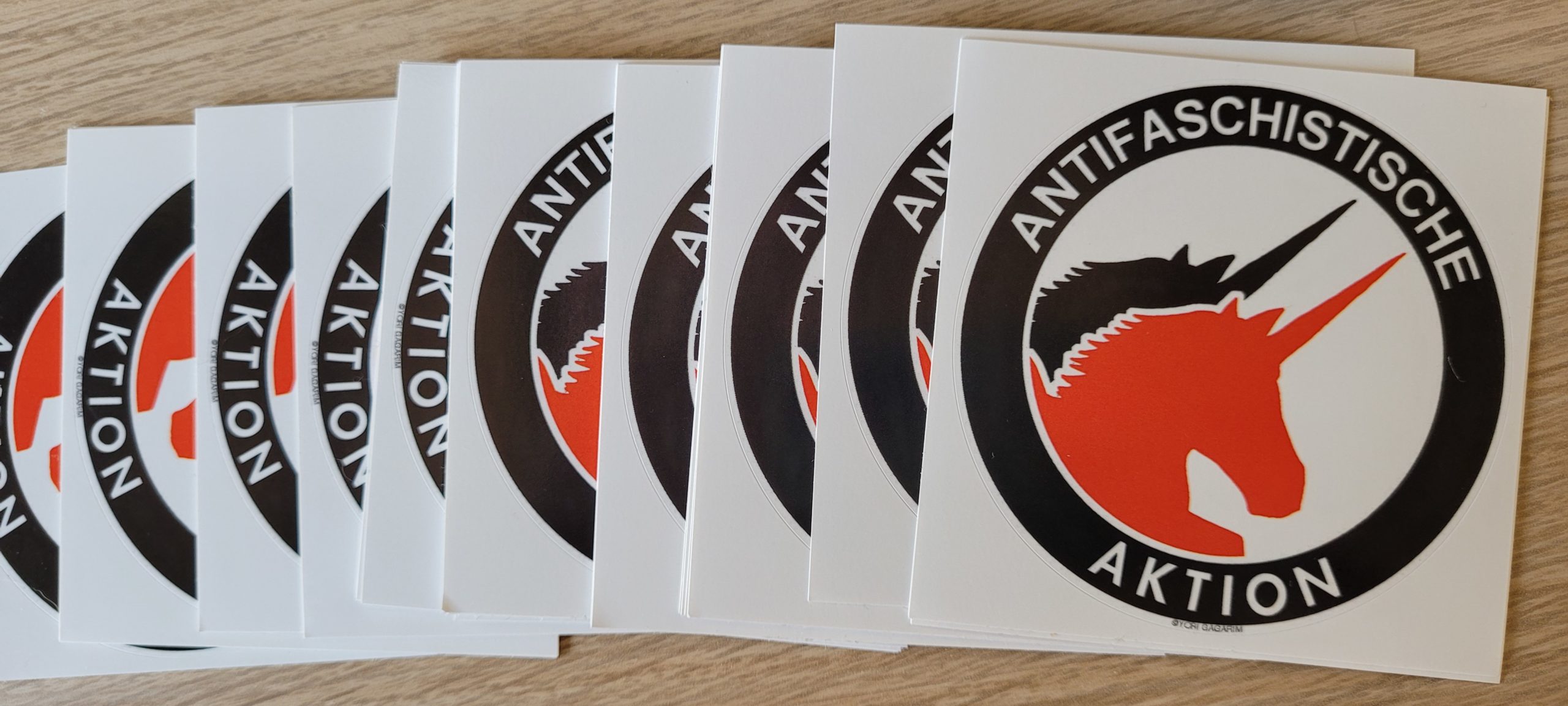 antifascist action stickers with unicorns on them