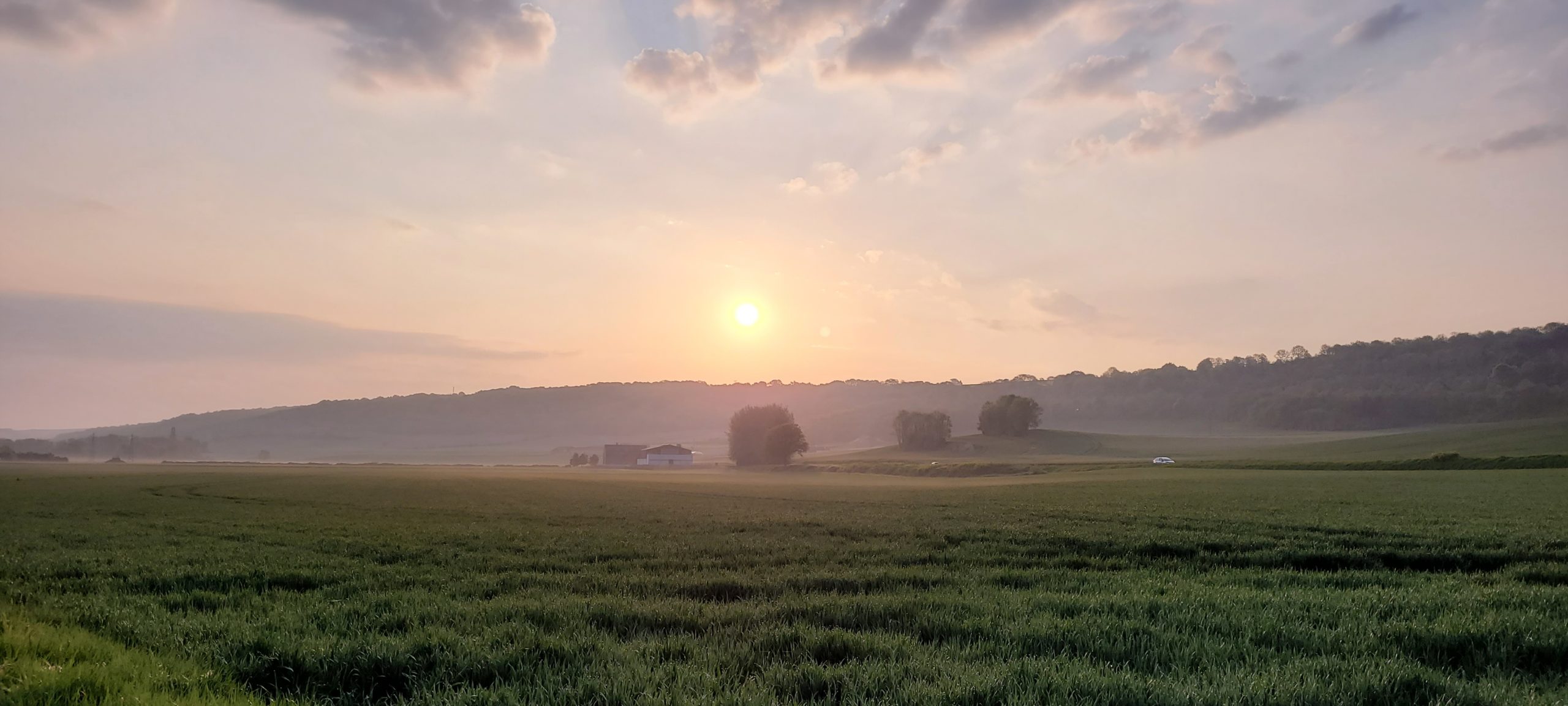 sunrise in misty French countryside