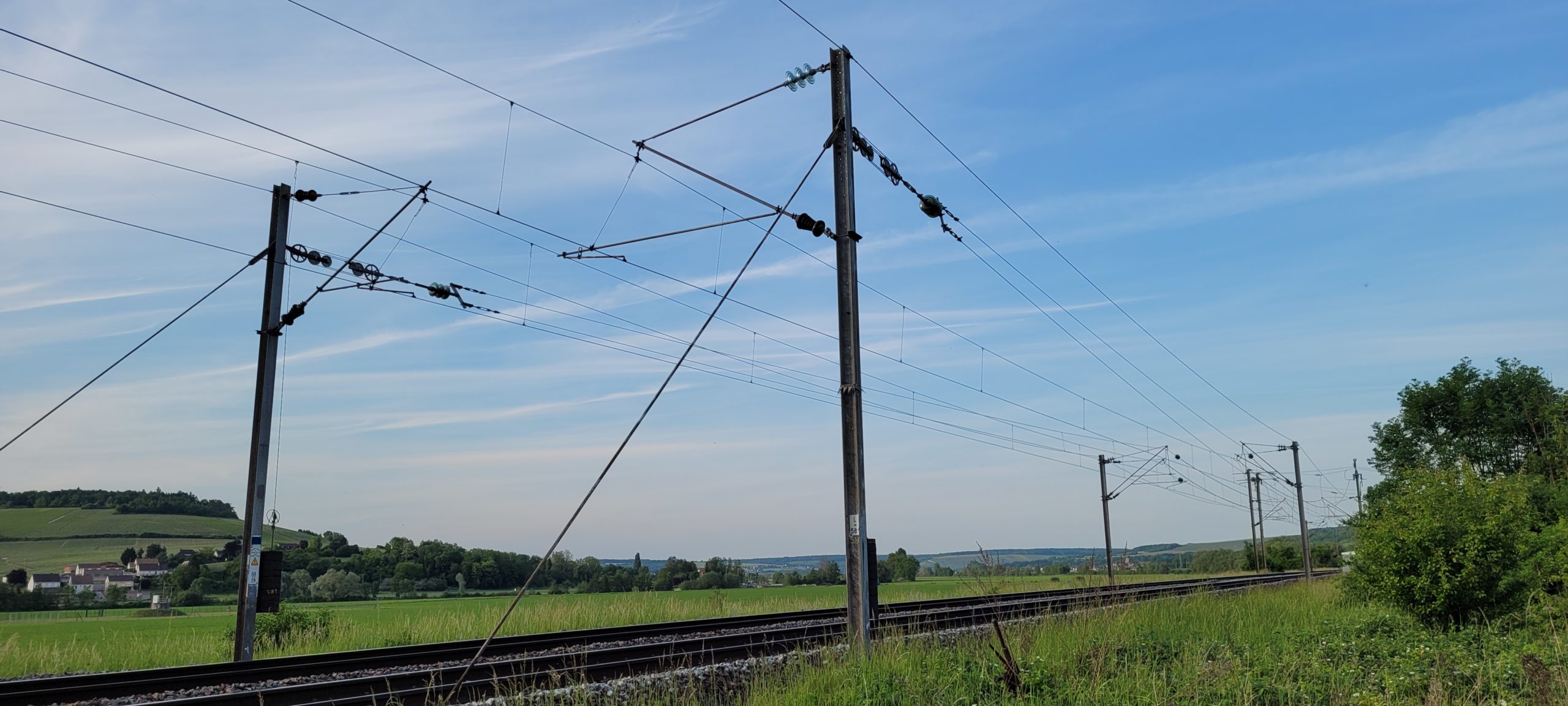 powerlines over train tracks