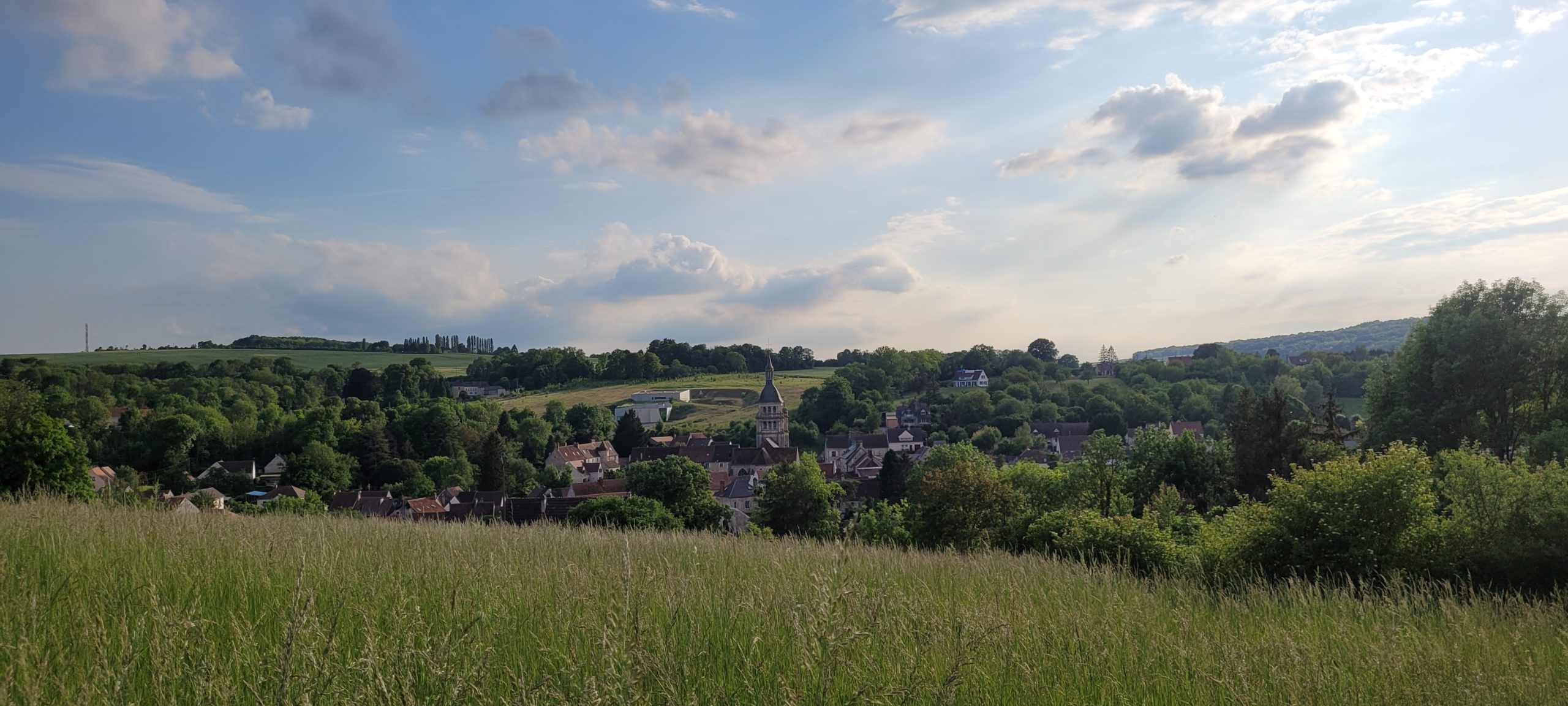 french countryside, blue sky with white clouds