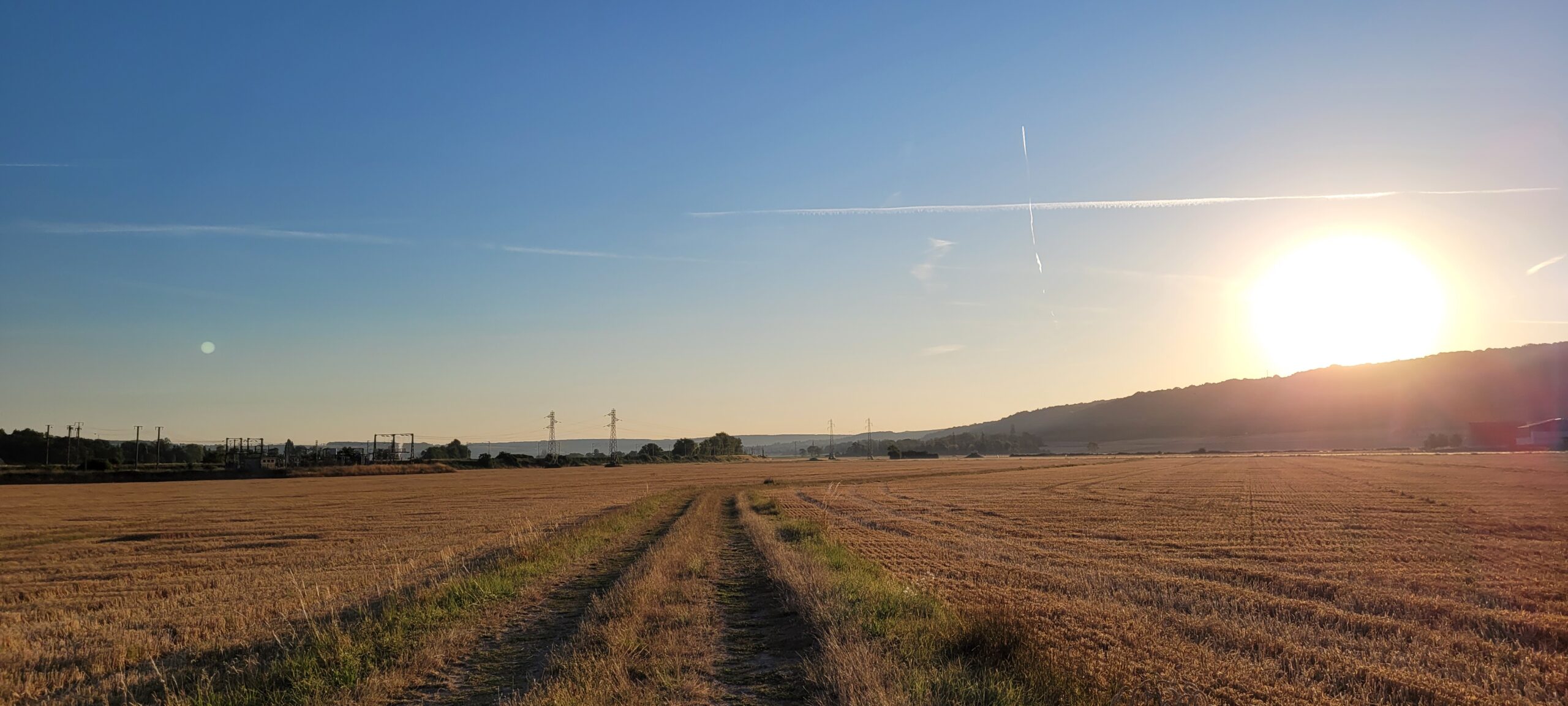 sunrise over farm fields