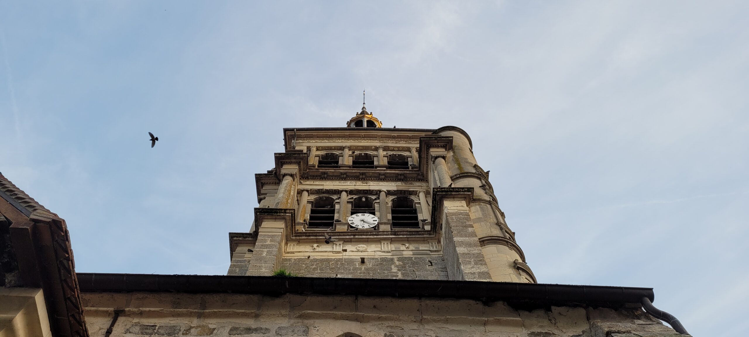 a church tower photographed from below looking up