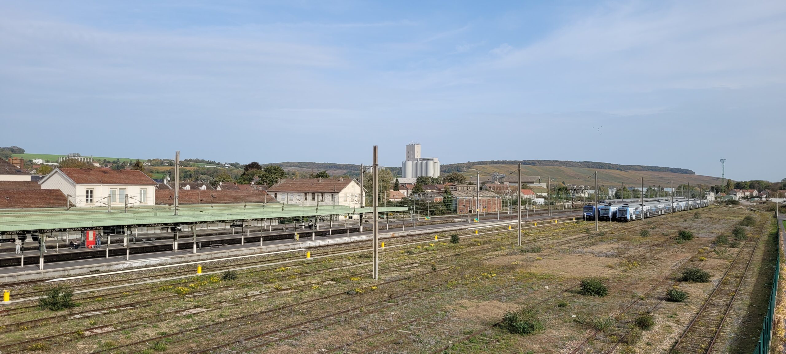 a French train station under blue sky