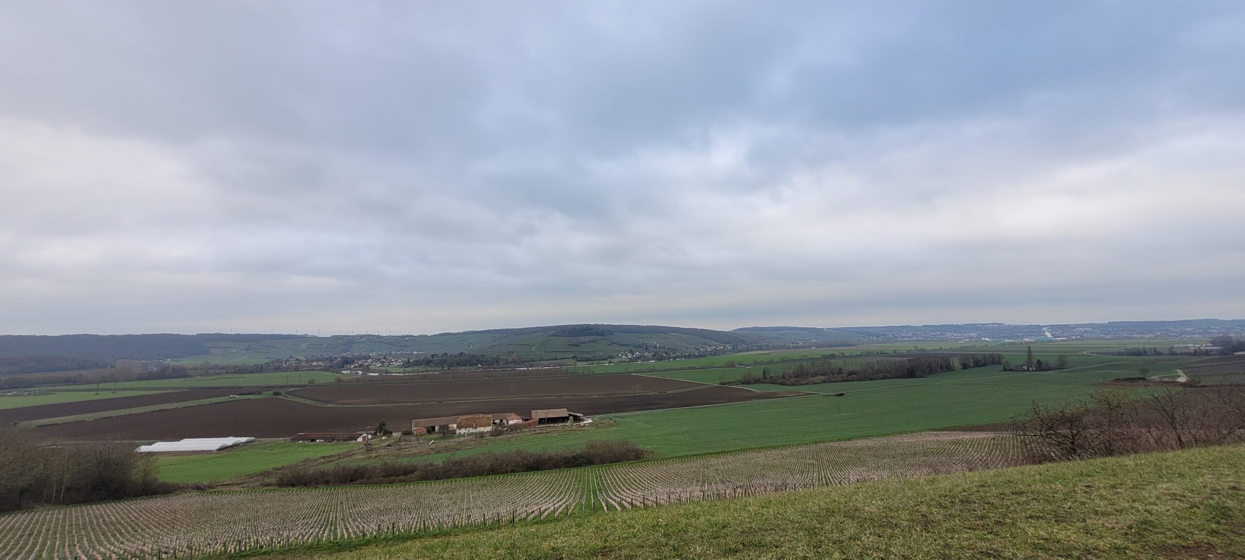 a cloudy sky over french countryside